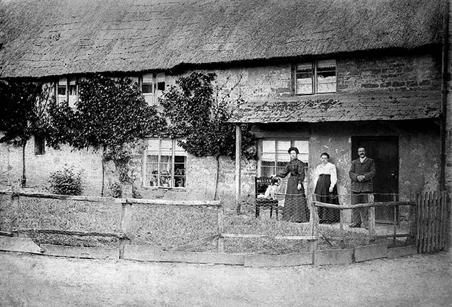 Last miller at Clifton Mill, George Robinson with wife and daughter Elsie