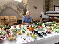 Mark Ryland and the charity sale table