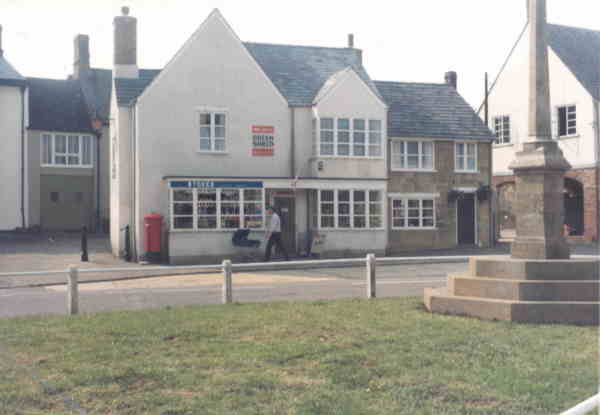 The newly constructed house and War Memorial in the 'Market Place'