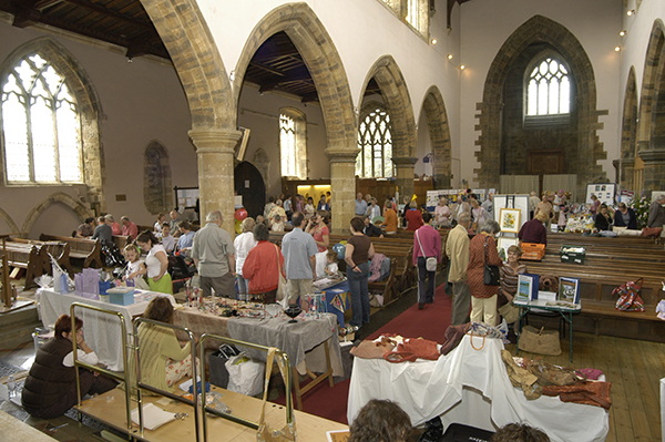 Market day during the Festival, stalls in the church