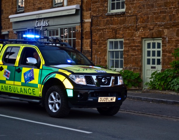 Local ambulance driver going through the Market Place at 8pm to join the clapping for carers