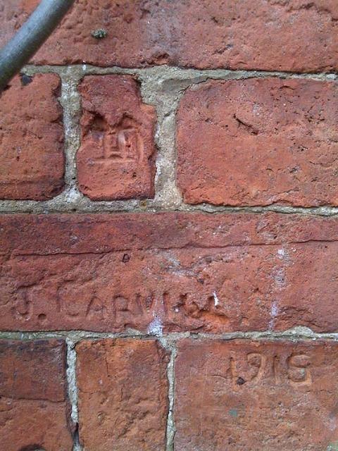 WJ Carvill - brick carving