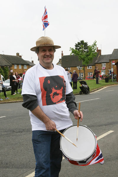 Chairman of the Parish Council Al Collins accompanies the band