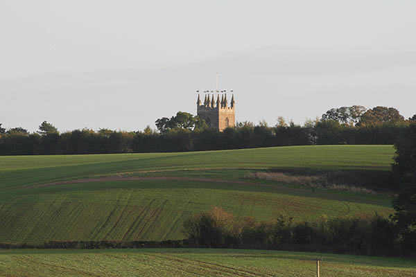 A clear view across fields to the Church