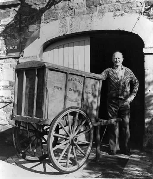 Fred England, landlord of the Crown & Tuns in the 1970s, with his baker's cart