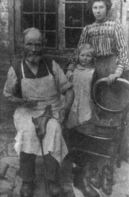 James Banes, Shoemaker and Shoemender, at work c. 1910