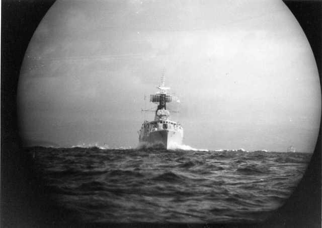 Periscope shot of frigate at close range