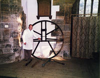 Captain of the Tower, Bill Ivings, with part of the bell ringing mechanism