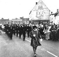 The Beefeater and cadets reach the Maket Place