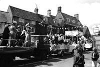 The parade of floats  reaches the Market Place