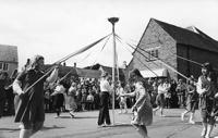 Primary School children, maypole dancing