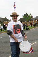 Chairman of the Parish Council Al Collins accompanies the band