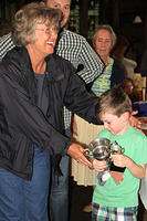 Maureen Forsyth presenting the Cup for the Child Champion to a rather shy Jonty Morris